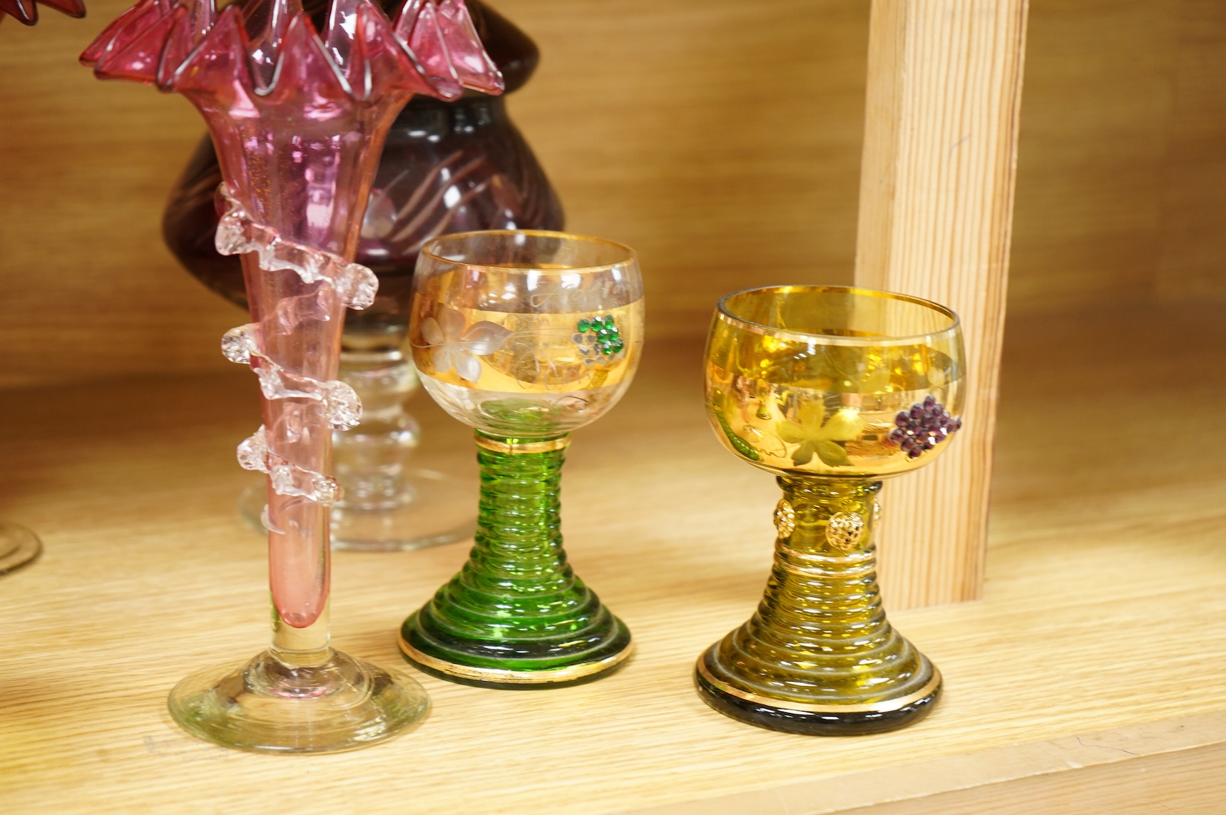 A collection of 19th century and later glassware to include three goblets, a pair of vases with trailed decoration and a Caithness glass vase, largest 28cm high